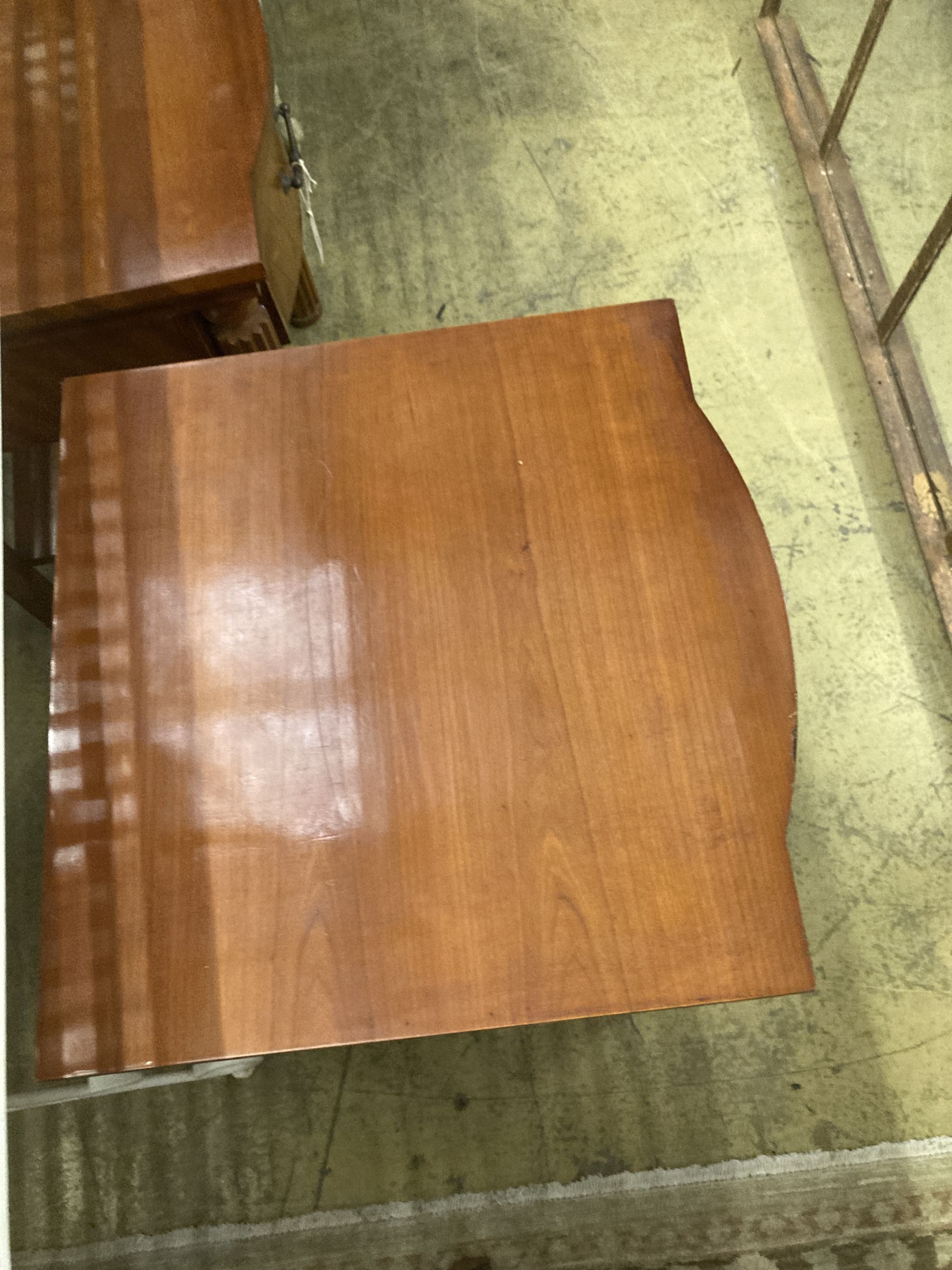 A pair of reproduction walnut bowfront bedside tables, width 50cm depth 50cm height 61cm